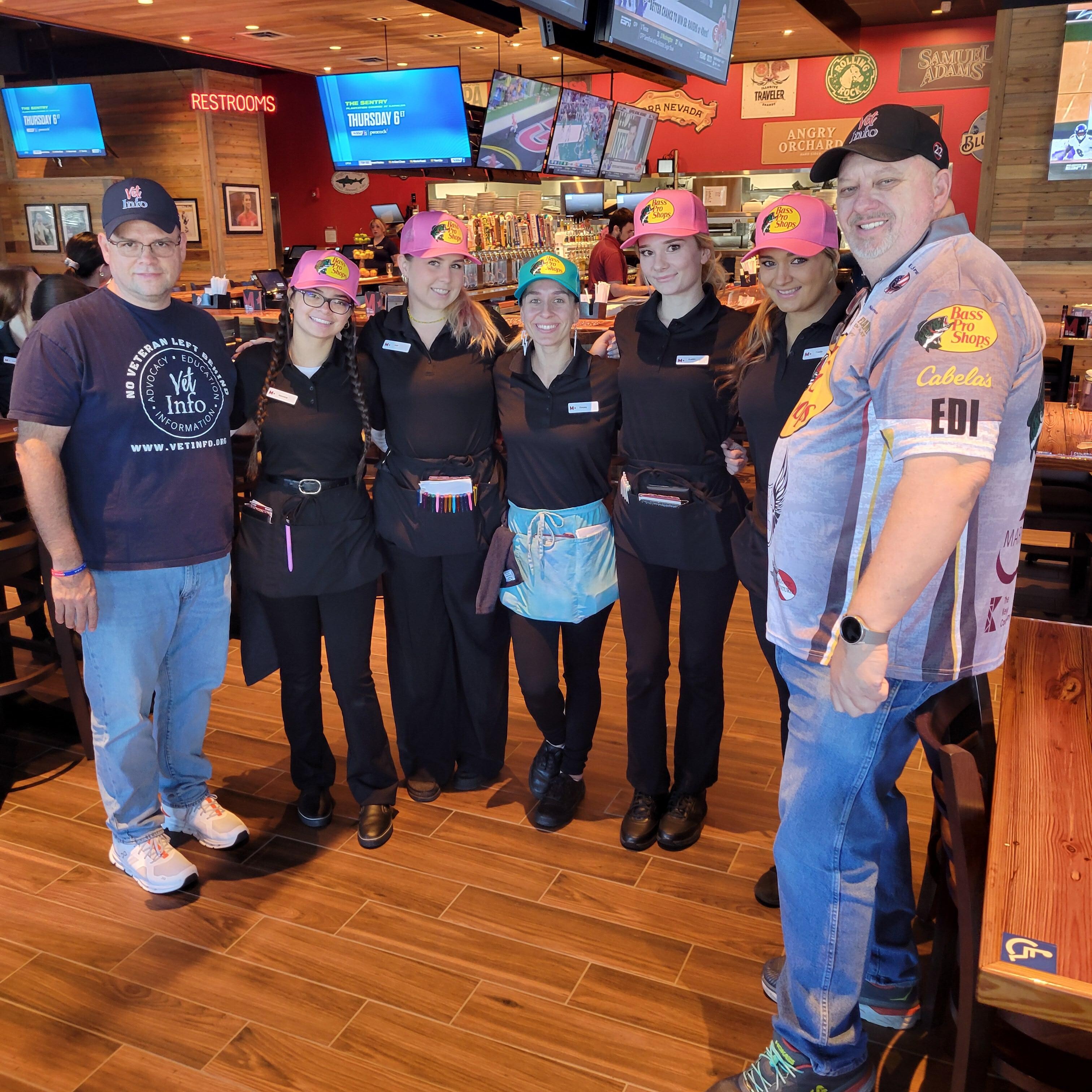 Ale House Staff Showing of Bass Pro Hats
