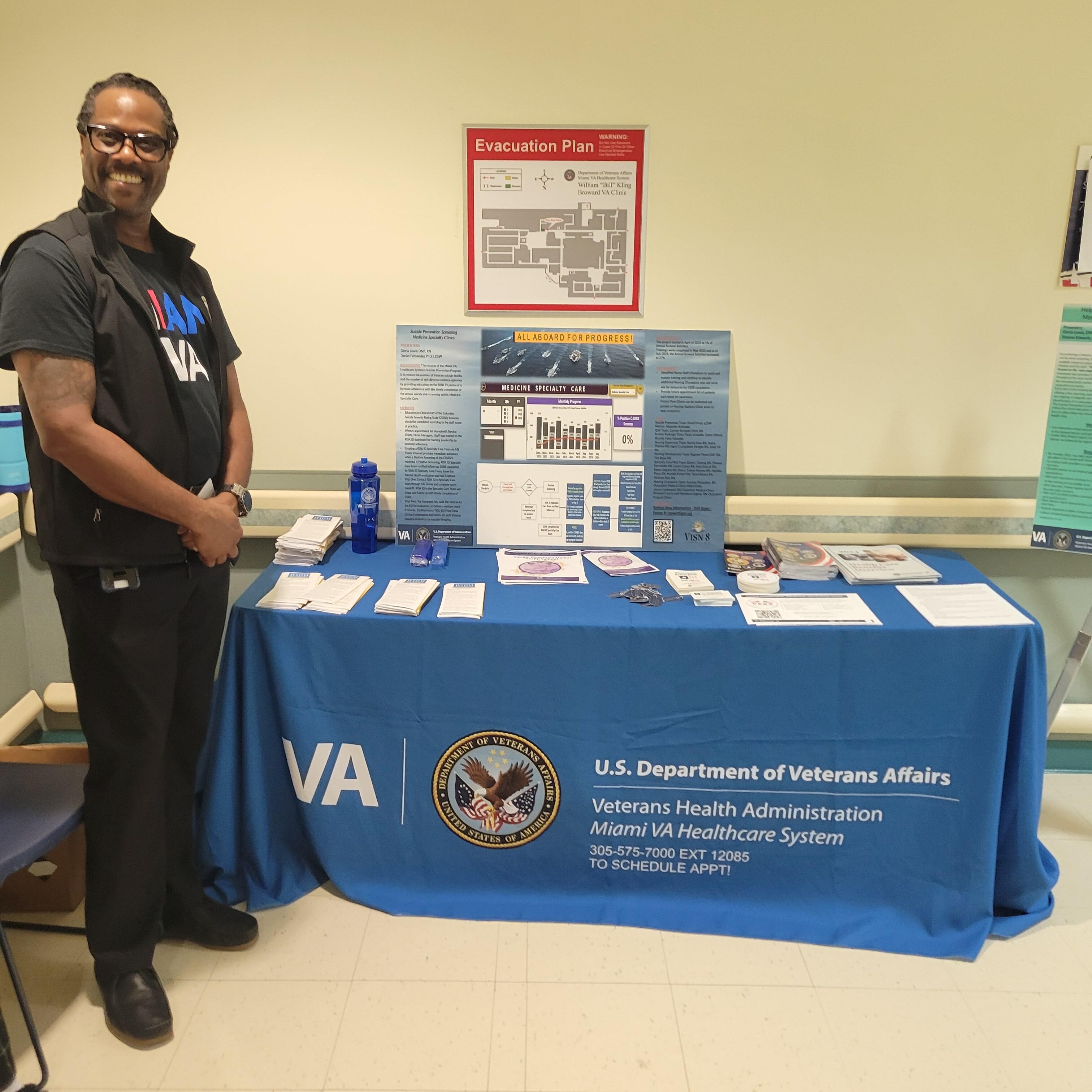 Miami VA Employee set up ready to meet with the Veterans