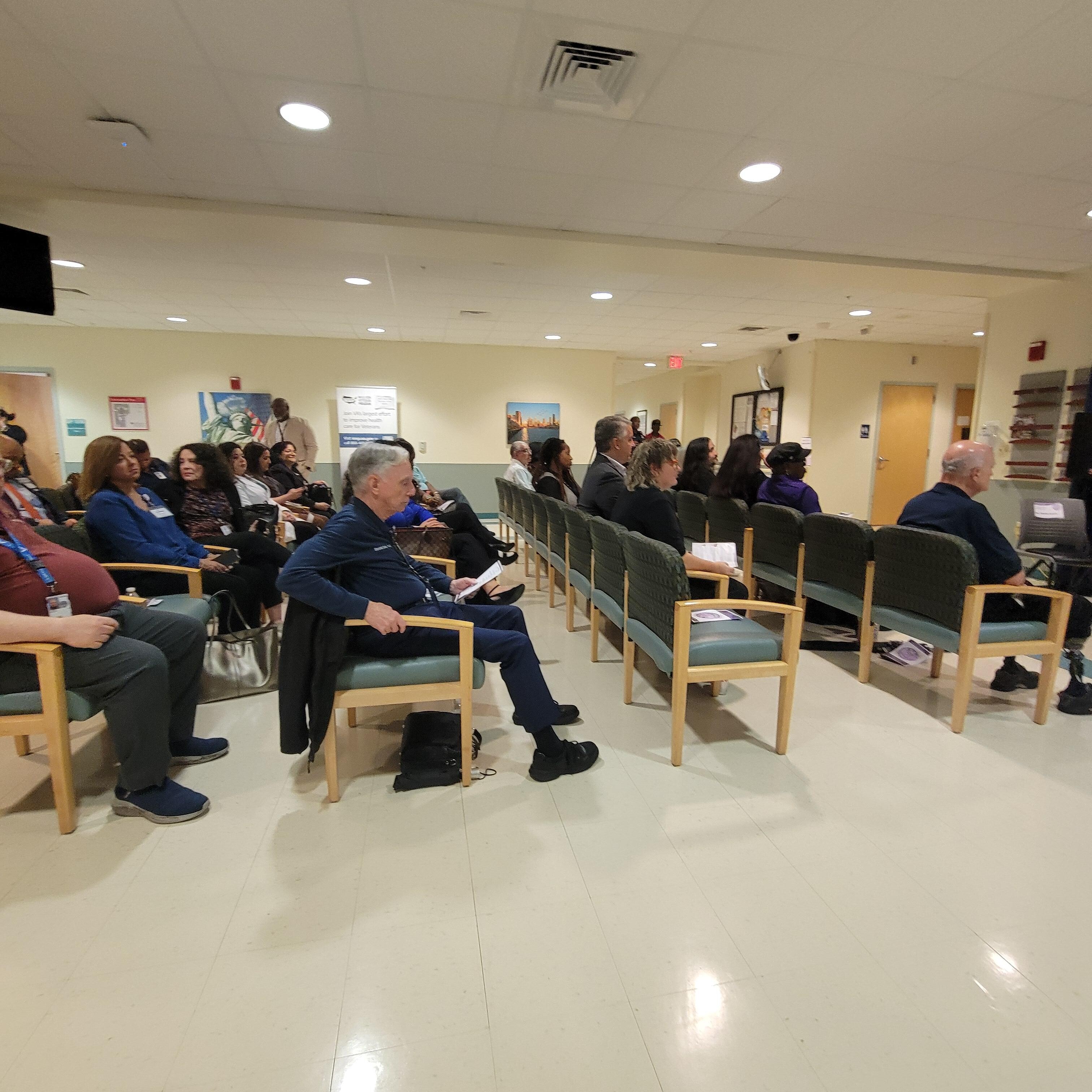 Veterans and Employees listening to the program