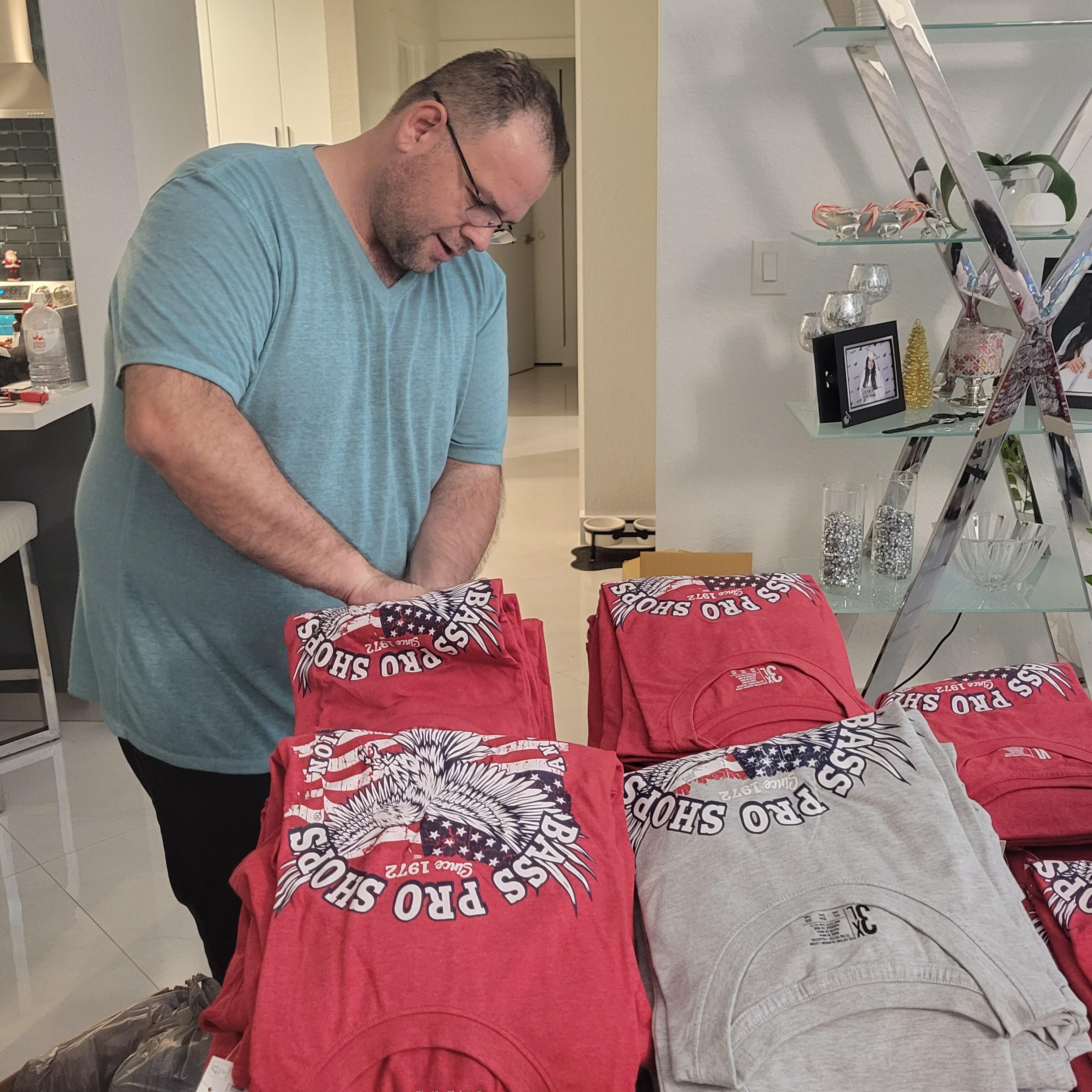 Vet Info Mark Prepping the shirts from Bass Pro Shops